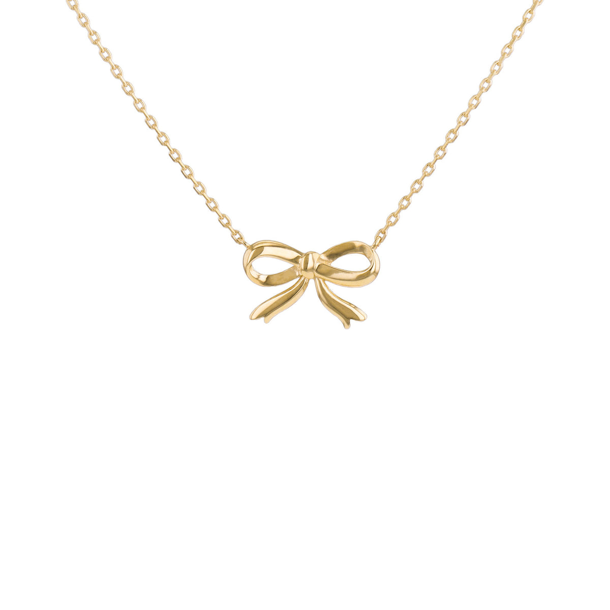 A delicate gold chain necklace featuring a small bow-shaped pendant, shown against a plain white background.