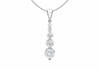 A silver pendant necklace featuring a vertical drop design with four graduated round-cut clear gemstones, suspended from a delicate silver chain against a plain white background.