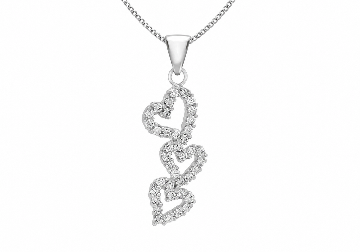 A silver pendant necklace featuring three vertically stacked, intertwined open heart shapes encrusted with small clear stones, suspended from a delicate silver chain against a plain white background.