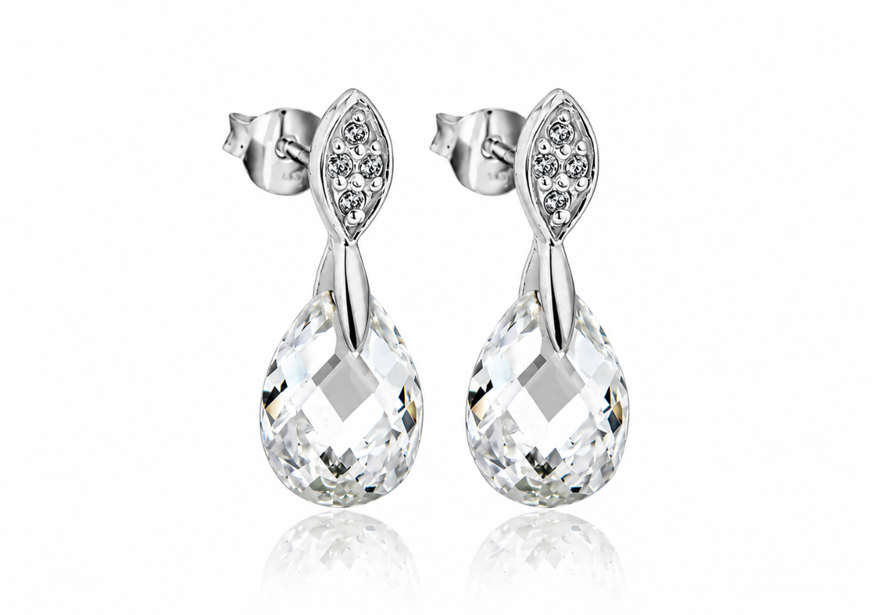 A pair of silver teardrop dangle earrings with marquise-shaped crystal clusters at the top and large faceted clear teardrop gemstones below, shown on a white background with a soft reflection.